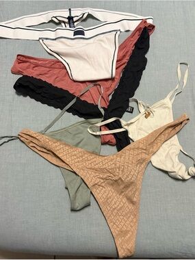 SKIMS Thong bundle in Cream, Rust, Black, Olive, and Tan